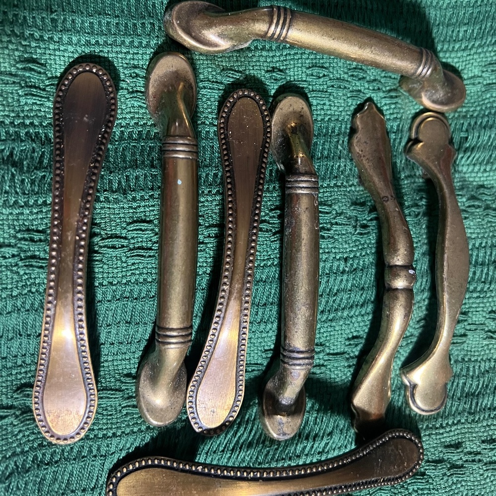 Eight Brass Cabinet Pulls...Various Patterns